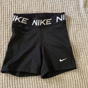 Nike’s short black with white around the waist